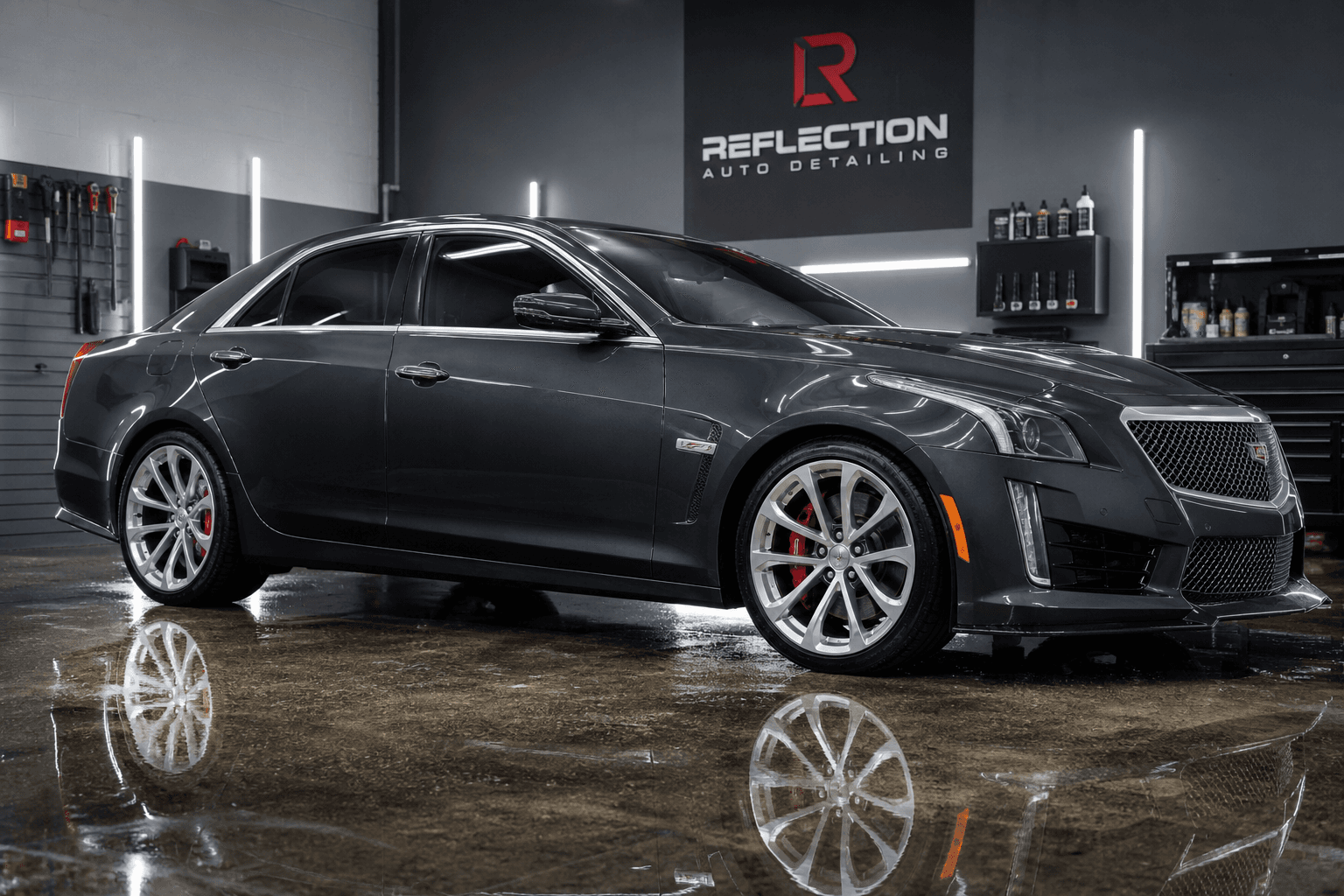 Exterior car detailing gloss finish on black sedan in Denver